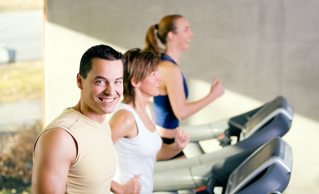 people having fun on the treadmill