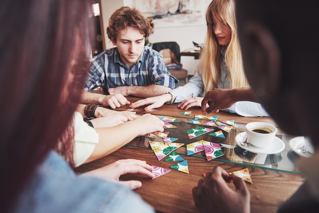 People having fun while playing board game