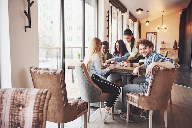 People having fun while playing board game