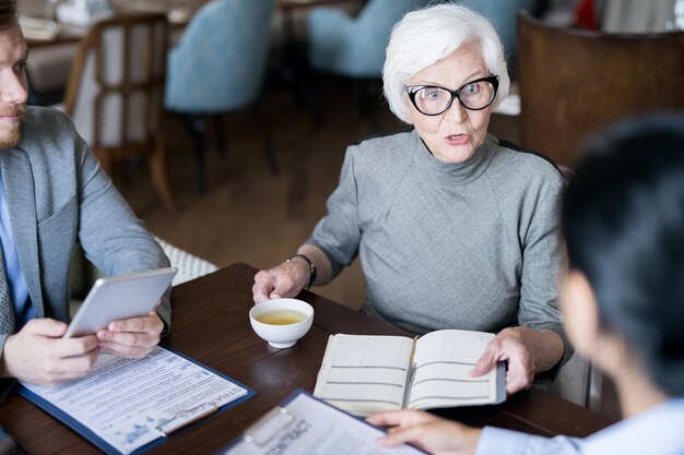 People having a meeting at cafe