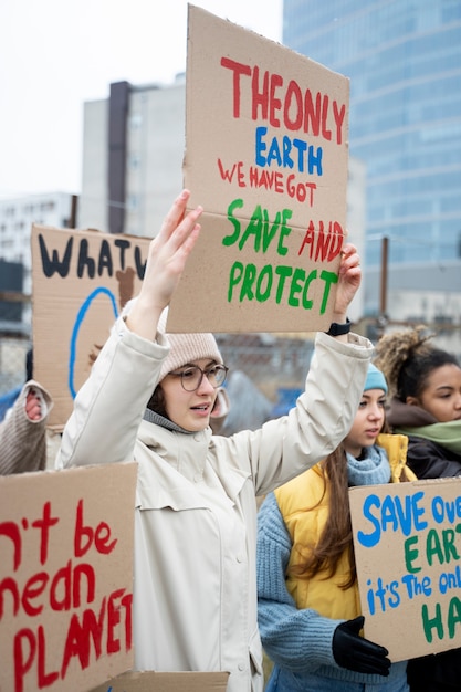 Photo people having a protest for world environment day