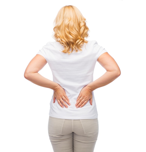 people, healthcare, backache and problem concept - woman suffering from pain in back or reins