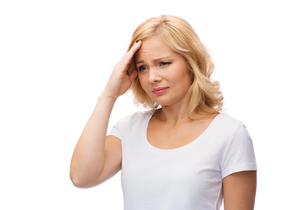 people, healthcare, stress and problem concept - unhappy woman suffering from headache