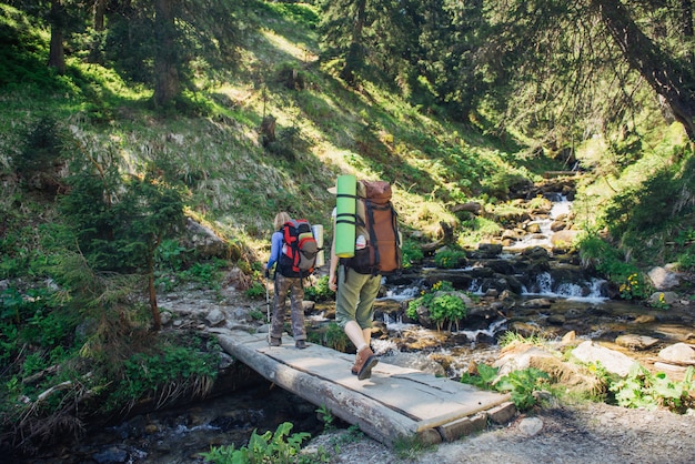 People hiking in Carpathian mountains