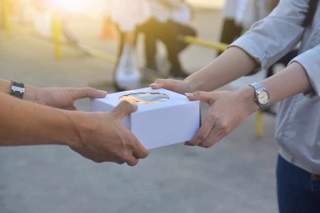 People holding gift box