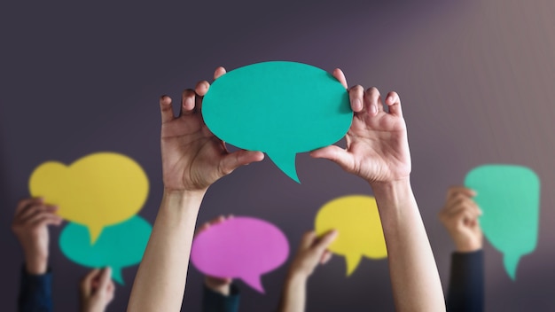 Photo people holding speech bubbles