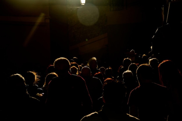 Photo people at illuminated stage theater