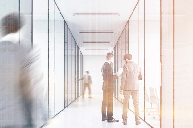 People in a long office corridor with glass walls. There are several conference rooms in it and. Concept of a successful company. 3d rendering. Toned image. Double exposure