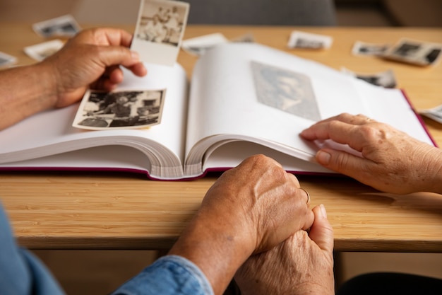 People looking over picture album