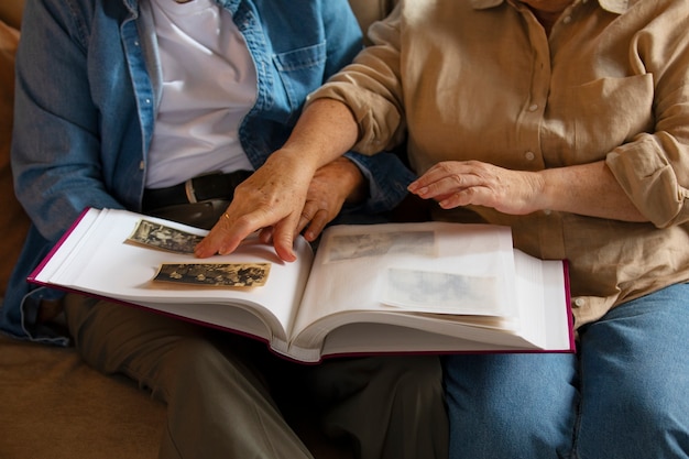 people looking over picture album