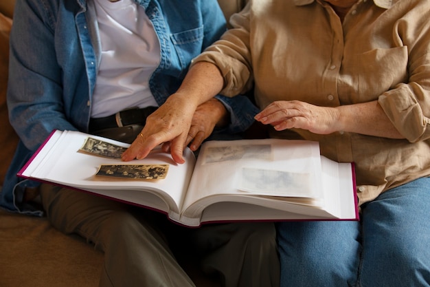 People looking over picture album