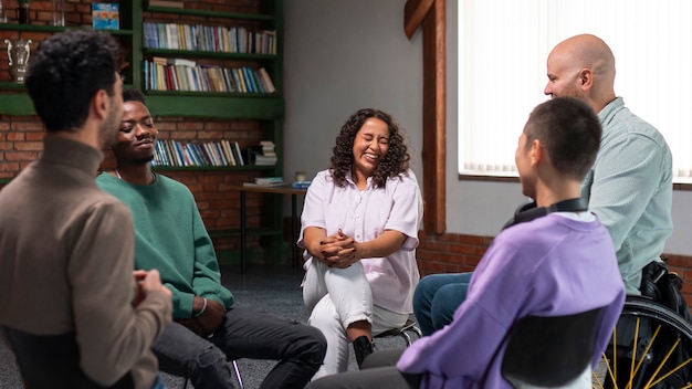 people meeting in support group