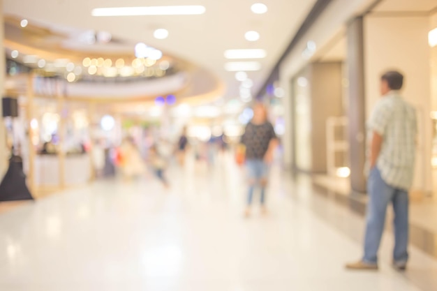 People in motion in escalators at the modern shopping mall