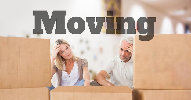 people moving boxes into new home