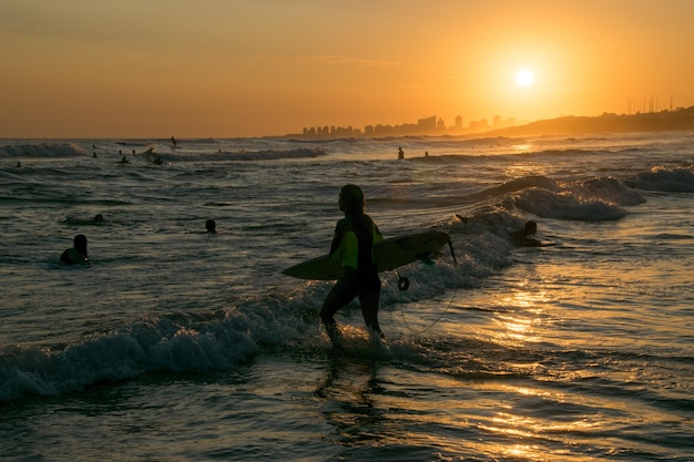 People playing in the beach during summer