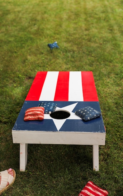 Photo people playing cornhole a popular american sport representing camaraderie outdoor leisure compet