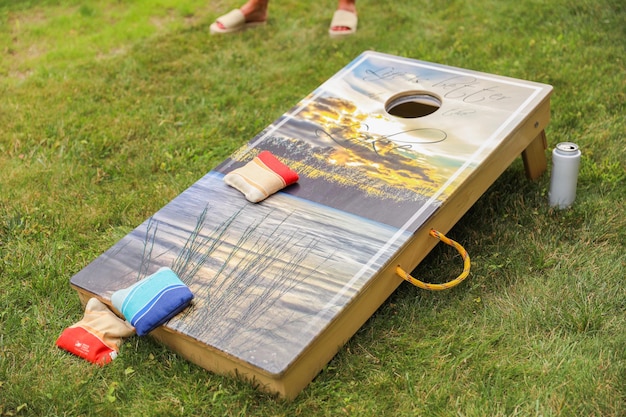 Photo people playing cornhole a popular american sport representing camaraderie outdoor leisure compet