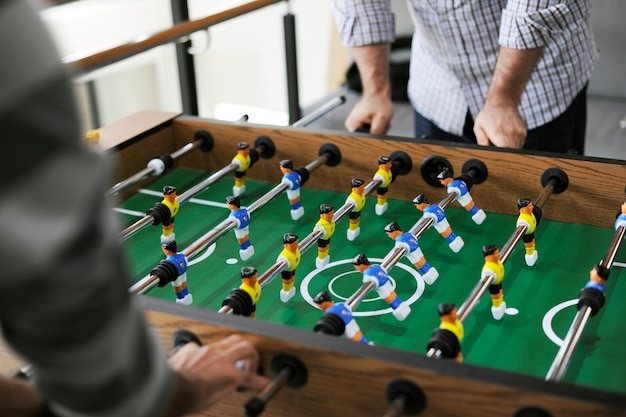 People playing table football