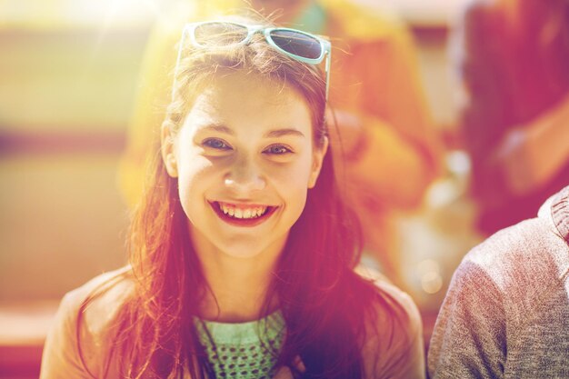 Photo people and portrait concept - happy teenage girl face