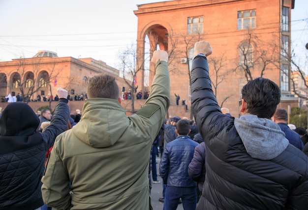 People raised hands during the demonstration