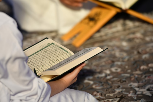 people reading the holy Quran