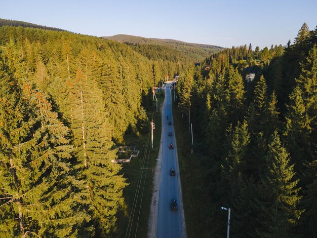 People riding atv at ukrainian carpathian mountains