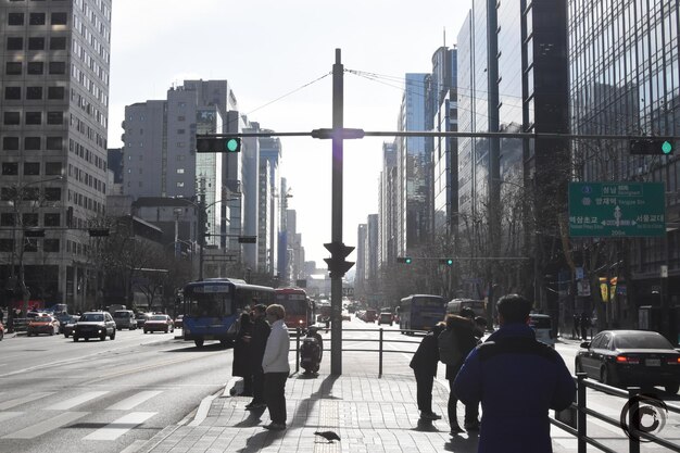 People on road in city during winter