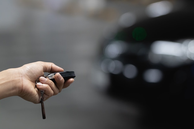 Photo people 's hand holding car's key