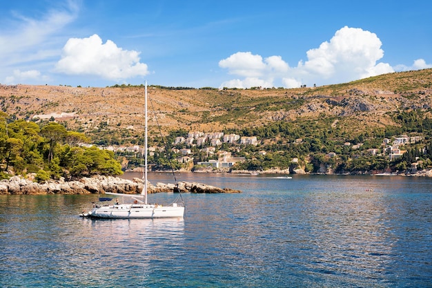 People in Sailboat at Lokrum Island in Adriatic Sea in Dubrovnik, Croatia