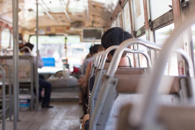 Photo people sitting in bus