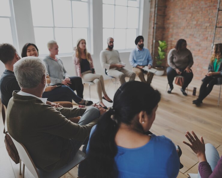 Photo people sitting in a circle counseling