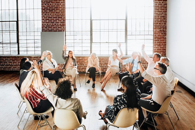 People sitting and talking with a group