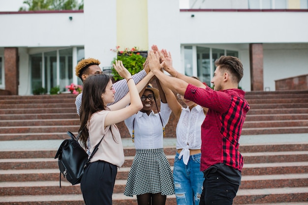 Photo people stacking hands all together