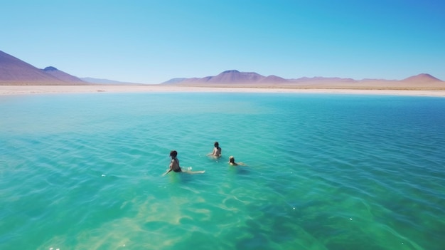 People swimming in the clear blue water of the bosque de boliva