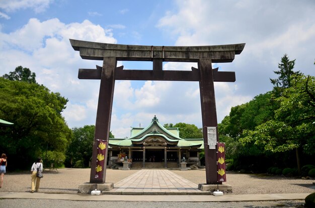 People travel and pray Hokoku Shrine it is one of several Toyokuni shrines built in honor of Toyotomi Hideyoshi at Osaka Castle Park on July 10 2015 in Osaka Japan