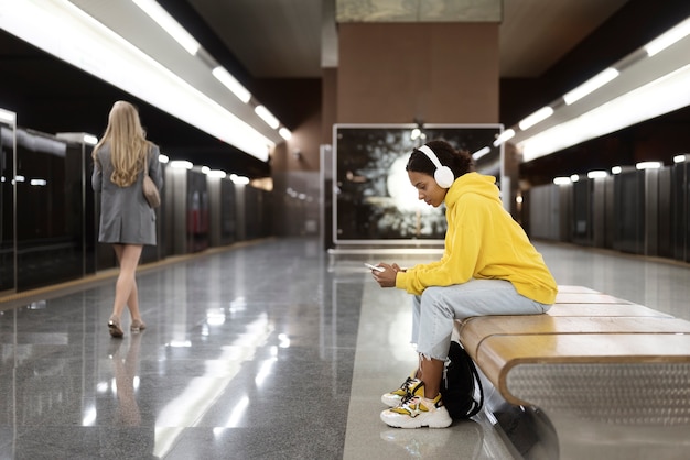 people traveling on the subway in winter time