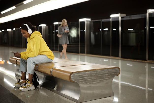 people traveling on the subway in winter time