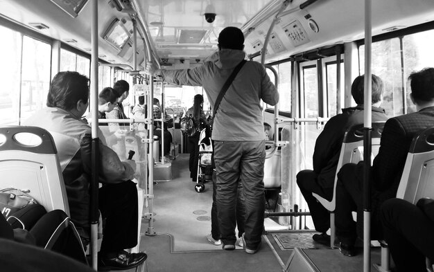 Photo people travelling in bus