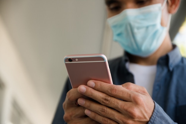 People use their phones to register and notify their timeline to monitor and control the spread of COVID-19.,People use smartphone check in timeline on application prevent covid19 coronavirus