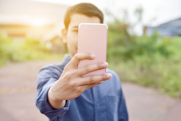 People using smartphone to shopping by internet online, Man holding mobile phone on hand