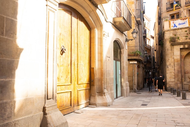 People Visiting The Gothic Quarter Which Is The Historic Centre Of The Old City Of Barcelona.