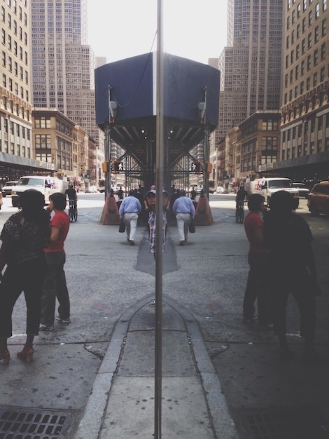 People walking on city street