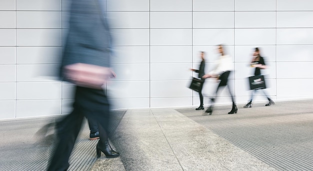 people walking in a corridor. ideal for websites and magazines layouts