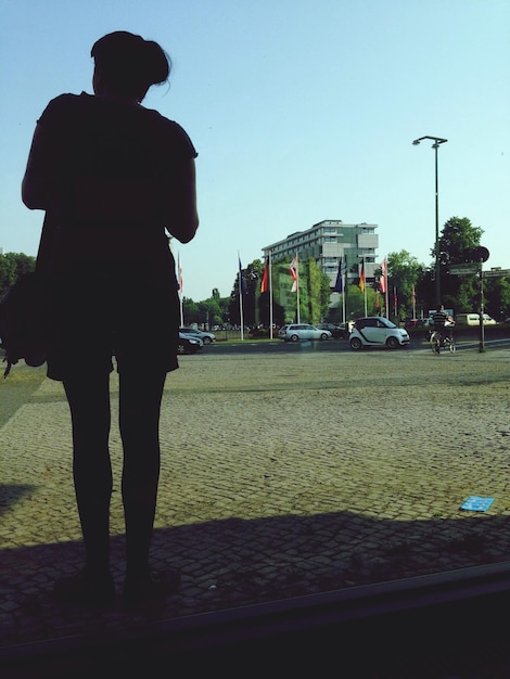 People walking on road in city