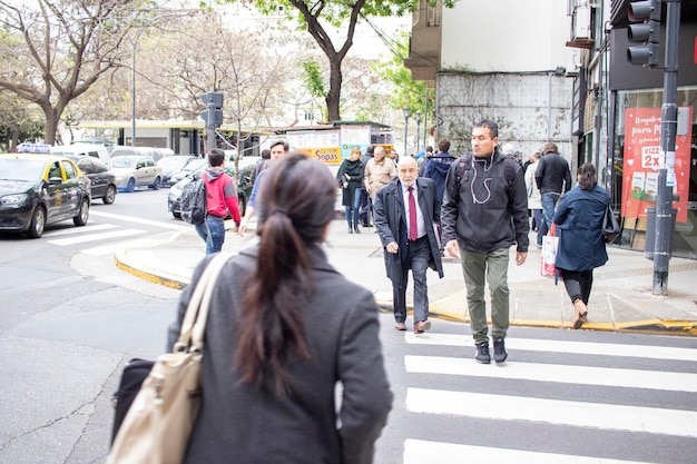 people walking through the streets of the city of buenos aires in argentina