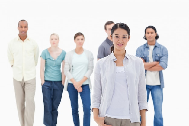 People behind a woman smiling