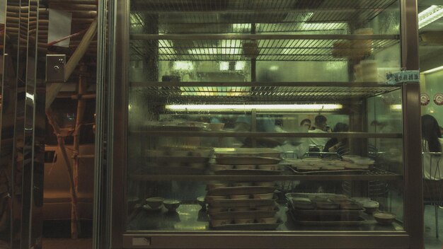 People working in glass window