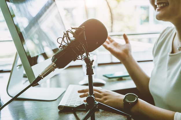 People working at home for making internet radio broadcasting channel live streaming talking meeting or discussion closeup condenser microphone.