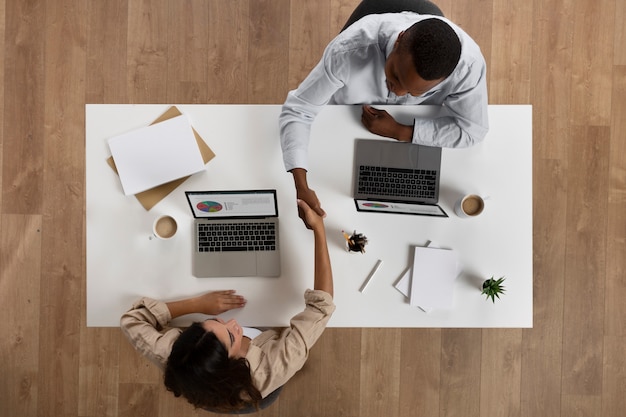 Photo people working at office above view