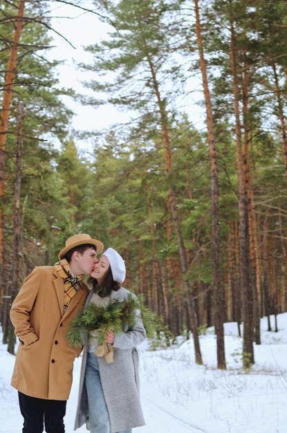 People, young couple walking, dancing in park. Family winter holidays, togetherness, date. Love